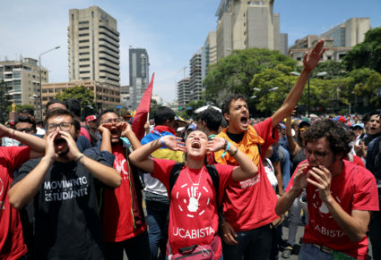 Supporters of Venezuelan opposition leader Juan Guaido, who many nations have recognised as the country's rightful interim ruler, chant slogans as they take part in a rally against the government of Venezuela's President Nicolas Maduro and to commemorate May Day in Caracas Venezuela, May 1, 2019. Photo by Manaure Quintero/Reuters