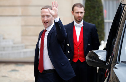 Facebook's CEO Mark Zuckerberg waves as he arrives for a meeting with French President Emmanuel Macron at the Elysee Palace in Paris, France, on May 10, 2019. Photo by Charles Platiau/Reuters