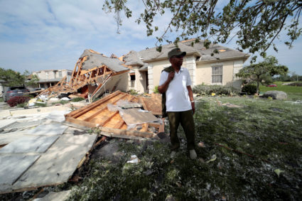 Daniel Williams, of Clayton, Ohio walks through his damaged property after a tornado touched down overnight near Dayton, Ohio, on May 28, 2019. Photo by Kyle Grillot/Reuters