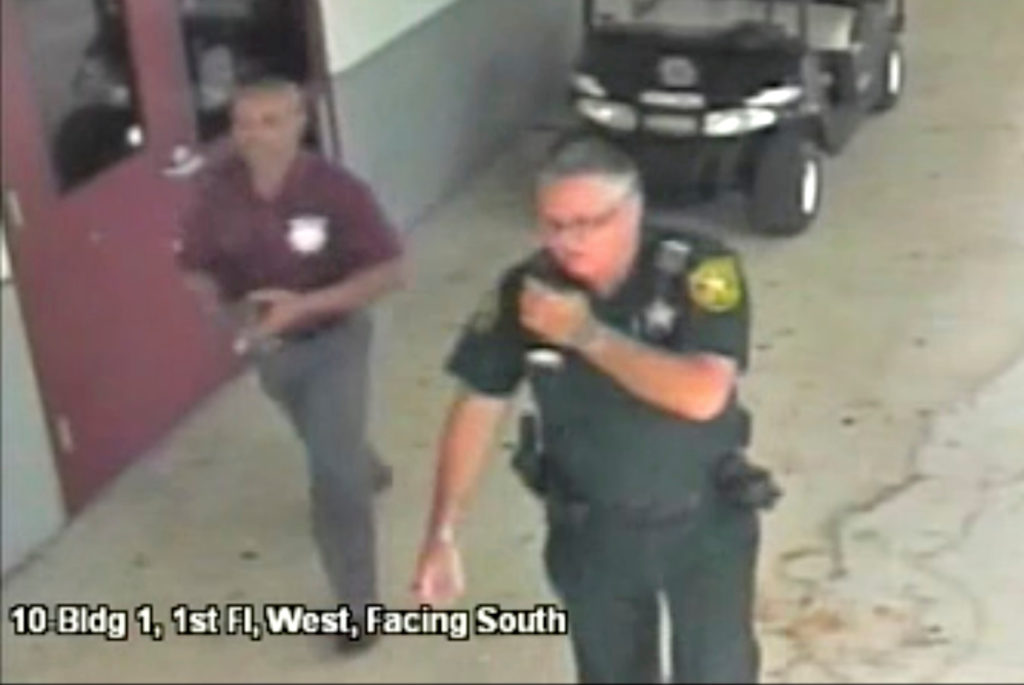 Then-Broward County Sheriff's Deputy Scot Peterson, who was assigned to Marjory Stoneman Douglas High School during the Fe...
