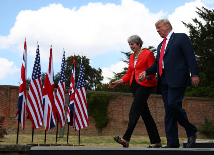 Britain's Prime Minister Theresa May and U.S. President Donald Trump walk away after holding a joint news conference at Chequers, the official country residence of the Prime Minister, near Aylesbury, Britain, July 13, 2018. Photo by Hannah McKay/Reuters