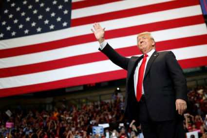 President Donald Trump acknowledges supporters as he holds a campaign rally in Estero, Florida, on October 31, 2018. Photo by Carlos Barria/Reutersa