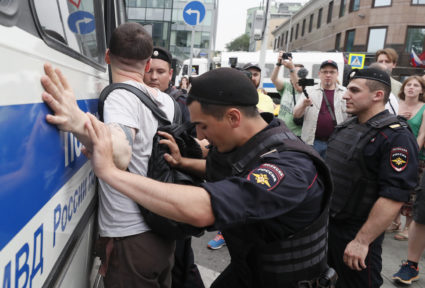 Law enforcement officers detain a participant of a rally in support of Russian investigative journalist Ivan Golunov, who was detained by police, accused of drug offences and later freed from house arrest, in Moscow, Russia June 12, 2019. Photo by Shamil Zhumatov/Reuters