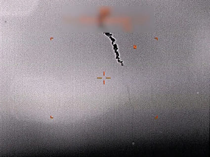 A still image from surveillance video provided by the U.S. military shows what they say is a drone being shot down over the Strait of Hormuz on June 20, 2019. Photo by U.S. Department of Defense/Handout via REUTERS