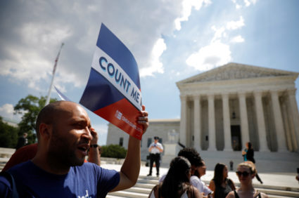 A protester holds a sign outside the U.S. Supreme Court, which ruled that President Donald Trump's administration did not give an adequate explanation for its plan to add a citizenship question to the 2020 census on June 27, 2019. Photo by REUTERS/Carlos Barria