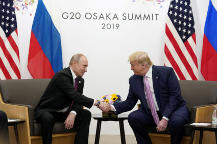 Russia's President Vladimir Putin and U.S. President Donald Trump shake hands during a bilateral meeting at the G20 leaders summit in Osaka, Japan. Photo by Kevin Lamarque/Reuters