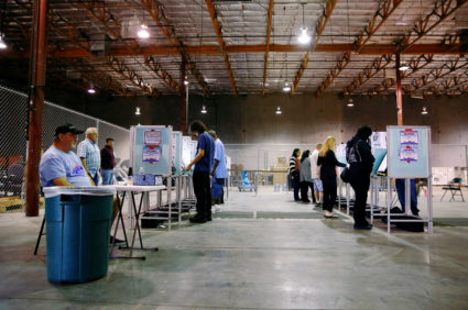 Voters take to the polls at a location near the Las Vegas Strip during the midterm election in Las Vegas, Nevada, U.S., November 6, 2018. REUTERS/Eric Thayer - RC1F6EADACE0