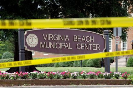 Police tape frames a sign at one of the entrances to the municipal government complex where a shooting incident occurred in Virginia Beach, Virginia, U.S. June 1, 2019. Photo By Jonathan Drake/Reuters