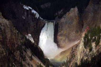A rainbow of light can be seen at the base of the 93 meter tall Yellowstone River Lower Falls in Yellowstone National Park, Wyoming, June 21, 2011. Photo by Jim Urquhart/Reutere\s