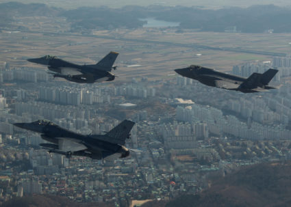 FILE PHOTO: A U.S. Air Force F-35A Lightning II assigned to Hill Air Force Base, Utah, conducts a training flight with F-16 Fighting Falcons assigned to Kunsan Air Base, South Korea over the city of Gunsan, in South Korea on December 1, 2017 in this U.S. Air Force photo and made available on December 5, 2017. Courtesy Josh Rosales/U.S. Air Force/Handout via Reuters