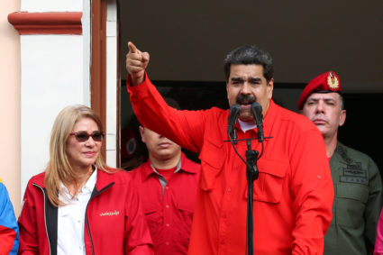 Venezuela's President Nicolas Maduro attends a rally in support of his government and to commemorate the 61st anniversary of the end of the dictatorship of Marcos Perez Jimenez next to his wife Cilia Flores in Caracas, Venezuela January 23, 2019. Photo by Miraflores Palace/Handout via Reuters