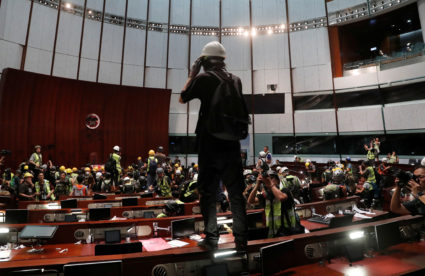 Protesters are seen inside a chamber after they broke into the Legislative Council building during the anniversary of Hong Kong's handover to China in Hong Kong, China July 1, 2019. Photo by Tyrone Siu/Reuters
