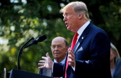 President Donald Trump has ordered administration officials to look into how to include a citizenship question on the census even though U.S. Commerce Secretary Wilbur Ross (left) said the Census Bureau already started the process of printing the questionnaires. Photo by Leah Millis/Reuters