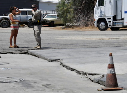 One of several surface cracks is seen in a road after an earthquake near Trona, California, on July 6, 2019. Photo by Gene Blevins/Reuters