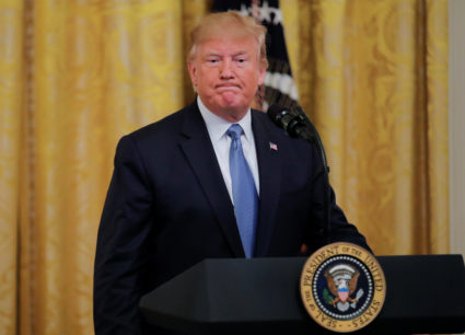 U.S. President Donald Trump arrives to speak about his administration's environmental policy in the East Room of the White House in Washington, on July 8, 2019. Photo by Carlos Barria/Reuters