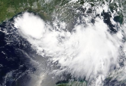Tropical Storm Barry is shown in the Gulf of Mexico approaching the coast of Louisiana, U.S. in this July 11, 2019 NASA satellite handout photo. Photo courtesy NASA/Handout via Reuters