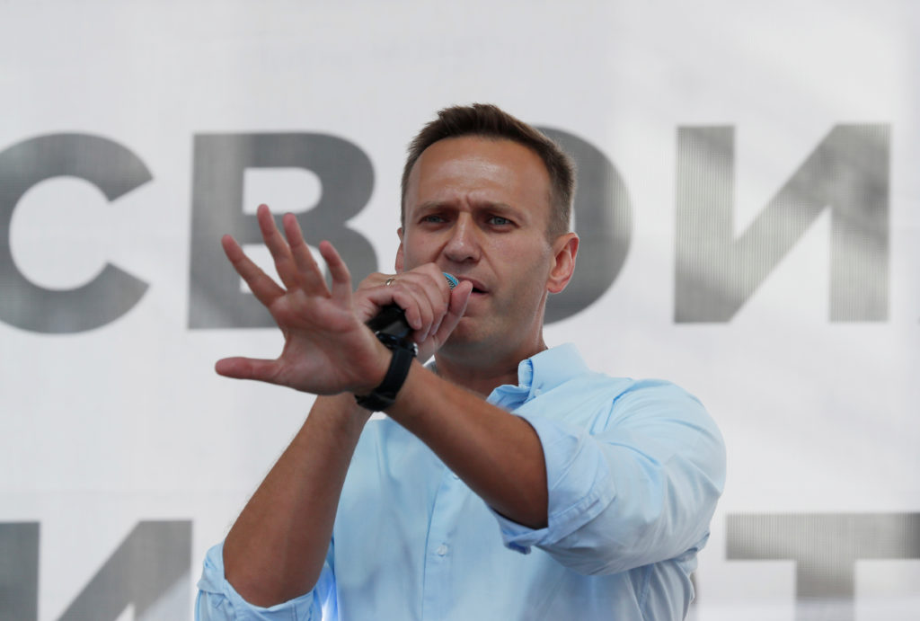 Russian opposition leader Alexei Navalny addresses demonstrators during a rally in support of independent candidates for e...