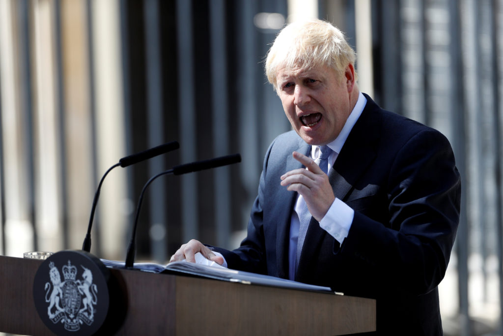 Britain's new Prime Minister, Boris Johnson, delivers a speech outside Downing Street, in London on July 24, 2019. Photo b...