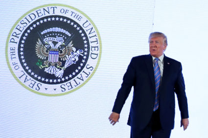 Altered presidential seal showed eagle with golf clubs at Trump speech