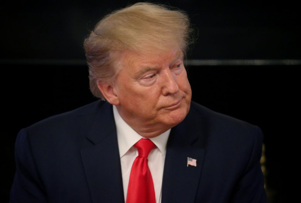 U.S. President Donald Trump participates in the "Pledge to America's Workers - One year Celebration" event in the State Di...