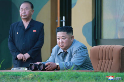FILE PHOTO: North Korean leader Kim Jong Un watches the test-fire of two short-range ballistic missiles on Thursday, in this undated picture released by North Korea's Central News Agency (KCNA) on July 26, 2019. Photo by KCNA/via Reuters