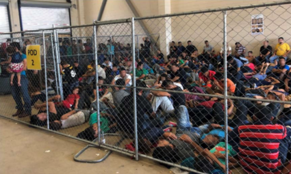 Migrants are crowded into a fenced in area at a Border Patrol facility in McAllen, Texas. Photo courtesy: Department of Homeland Security's Office of the Inspector General