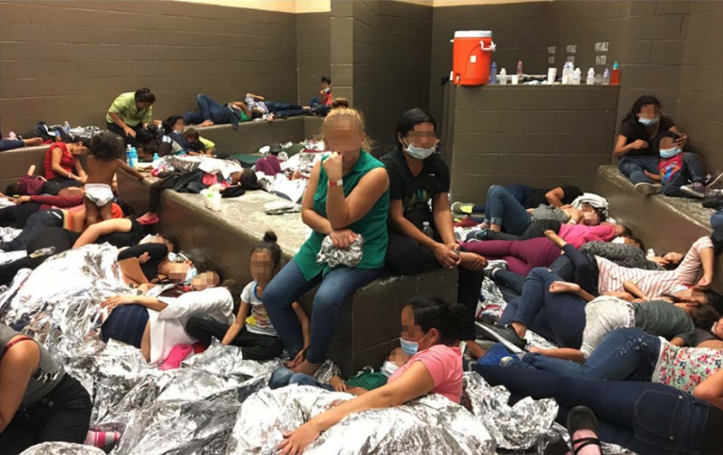 Families are seen crowded into a section of the Border Patrol station in Weslaco, Texas. Photo courtesy: Department of Hom...