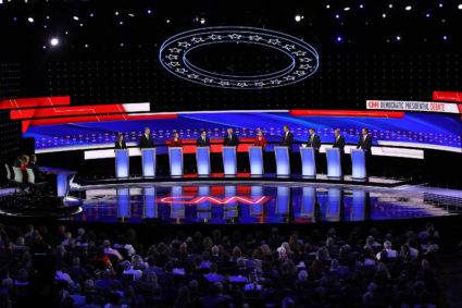 Democratic presidential candidates line up for an early debate. (Photo by Justin Sullivan/Getty Images)