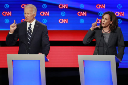 Former Vice President Joe Biden and U.S. Senator Kamala Harris gesture on the second night of the second 2020 Democratic U.S. presidential debate in Detroit, Michigan, July 31, 2019. REUTERS/Lucas Jackson