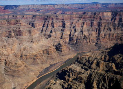 The Colorado River runs through the west rim of the Grand Canyon in Arizona, on February 28, 2018. Photo by Darrin Zammit Lupi/Reuters