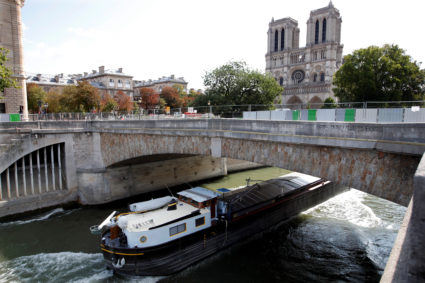 Fences surround Notre-Dame Cathedral in preparation for lead decontamination operation, in Paris France on August 13, 2019. Photo by Charles Platiau/Reuters