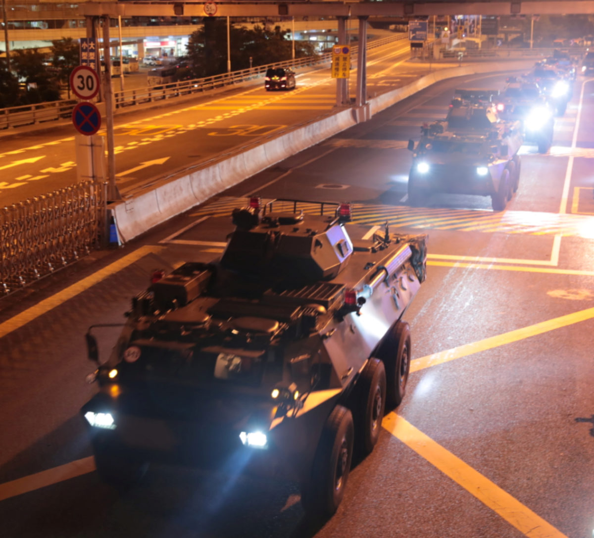 China rotates troops in Hong Kong amid mass protests | PBS News