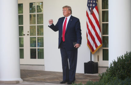 U.S. President Donald Trump makes a fist as he stands on the West Wing colonnade outside the Oval Office at an event to officially launch the United States Space Command in the Rose Garden of the White House in Washington, U.S., August 29, 2019. Photo by: Leah Millis/Reuters