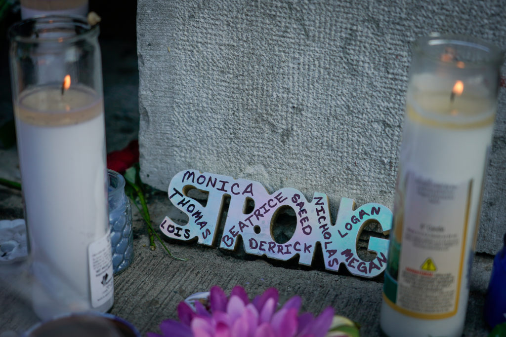 Candles burn as part of a memorial at the scene of Sunday mornings mass shooting in Dayton, Ohio, U.S. August 5, 2019. RE...