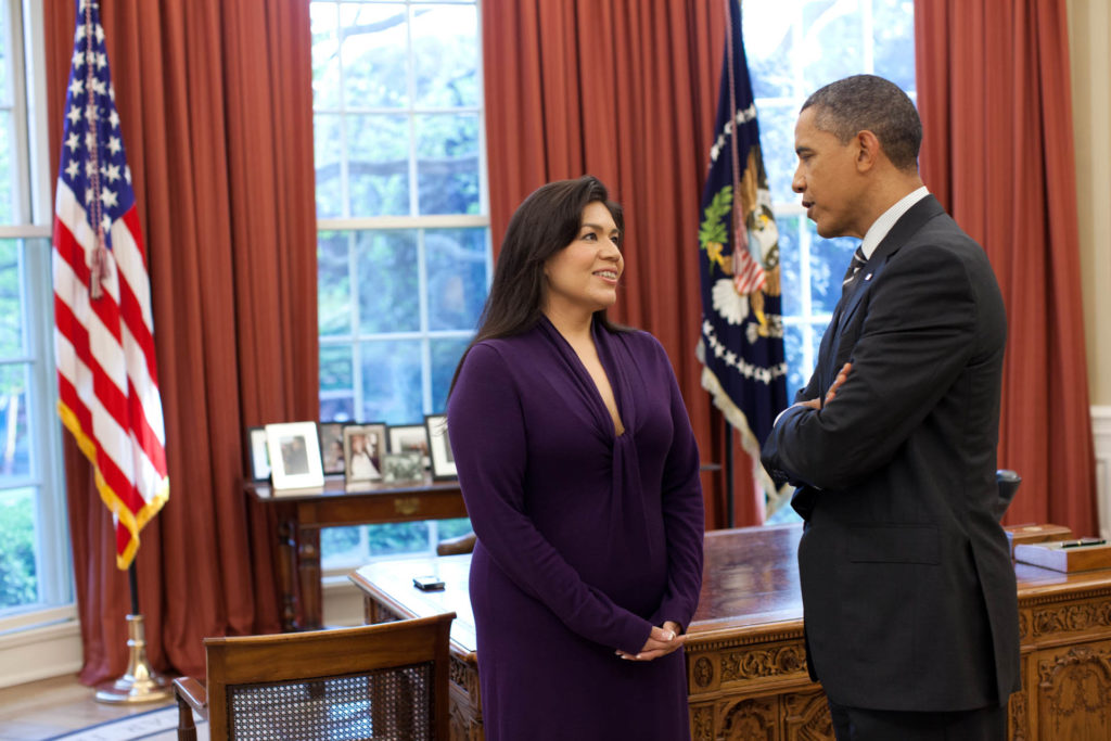 President Barack Obama talks with Kim Teehee, Senior Policy Advisor for Native American Affairs, in the Oval Office, April...