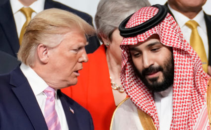 President Donald Trump speaks with Saudi Arabia's Crown Prince Mohammed bin Salman during family photo session with other leaders and attendees at the G20 leaders summit in Osaka, Japan, June 28, 2019. Photo by: Kevin Lamarque /Reuters