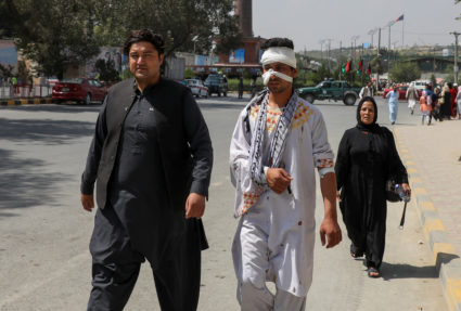 A wounded man walks after receiving hospital treatment, near the site of a suicide attack in Kabul, Afghanistan September 5, 2019. Photo by Omar Sobhani/Reuters