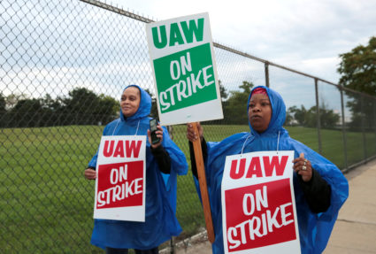 United Auto Workers, Aramark workers carry strike signs while picketing outside the General Motors Detroit-Hamtramck assembly plant in Detroit, Michigan, U.S. September 15, 2019. Photo by Rebecca Cook/Reuters