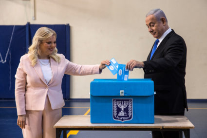 Israeli Prime Minister Benjamin Netanyahu and his wife Sara cast their vote during Israel's parliamentary election at a polling station in Jerusalem September 17, 2019. Photo by Heidi Levine/Pool via Reuters