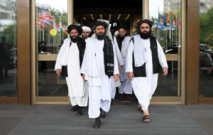 File photo from May 30, 2019: Members of a Taliban delegation, led by chief negotiator Mullah Abdul Ghani Baradar (center, front), leave after peace talks with Afghan senior politicians in Moscow, Russia, in May. Photo by Evgenia Novozhenina/Reuters