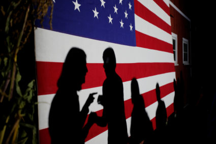 Democratic 2020 U.S. presidential candidate and U.S. Senator Elizabeth Warren (2nd L) talks to an audience member after a campaign stop in Hollis, New Hampshire, U.S., September 27, 2019. REUTERS/Brian Snyder TPX IMAGES OF THE DAY