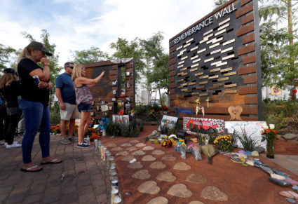FILE PHOTO: People look at a Remembrance Wall at the Las Vegas Healing Garden during the one-year anniversary of the October 1 mass shooting in Las Vegas, Nevada, U.S. October 1, 2018. Photo by Steve Marcus/Reuters