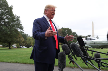 U.S. President Donald Trump talks to reporters as he departs for travel to Florida from the South Lawn of the White House in Washington, D.C. Photo by Leah Millis/Reuters