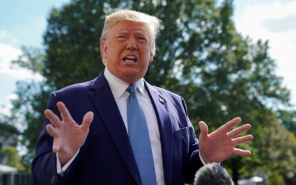 U.S. President Donald Trump responds to reporters questions as he heads to the Marine One helicopter to fly to visit injured members of the U.S. military at Walter Reed National Military Medical Center in Maryland from the White House in Washington, October 4, 2019. Photo by Kevin Lamarque/Reuters