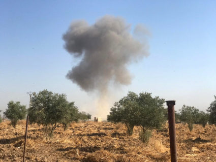 Smoke rises from Tel Arkam village in Ras al Ain countryside, Syria on October 10, 2019. Photo by Stringer via Reuters