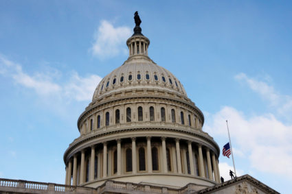 Police officers bring down the U.S. flag flying at half-mast above the U.S. Capitol after the death of U.S. Rep. Elijah Cummings (D-MD) in Washington, U.S., October 17, 2019. Photo by Carlos Jasso/Reuters