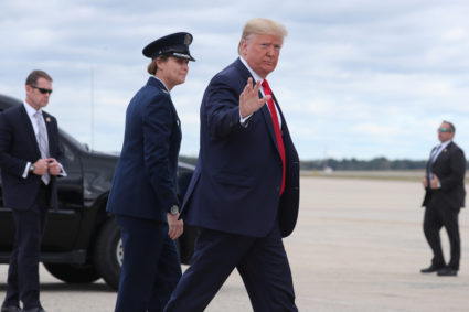 U.S. President Donald Trump gestures to the media as he departs Washington for campaign travel to Texas from Joint Base Andrews, Maryland, October 17, 2019. Photo by Jonathan Ernst/Reuters