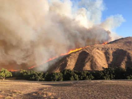 Fire is seen in Simi Valley, California, U.S. October 30, 2019, in this social media image. Courtesy of Twitter @415FirePhoto/Social Media via Reuters