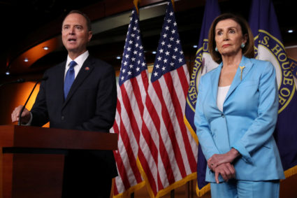 U.S. House Intelligence Committee Chairman Adam Schiff (D-CA) joins Speaker of the House Nancy Pelosi to speak about Democratic legislative priorities and impeachment inquiry plans during her weekly news conference at the U.S. Capitol in Washington, U.S., October 2, 2019. REUTERS/Jonathan Ernst