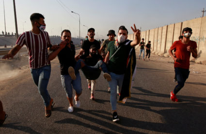 News Wrap: Iraqi security forces kill at least 12 more protesters